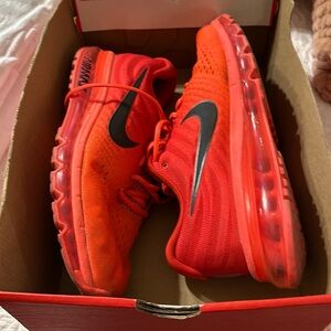 Nike Air Max red athletic shoes